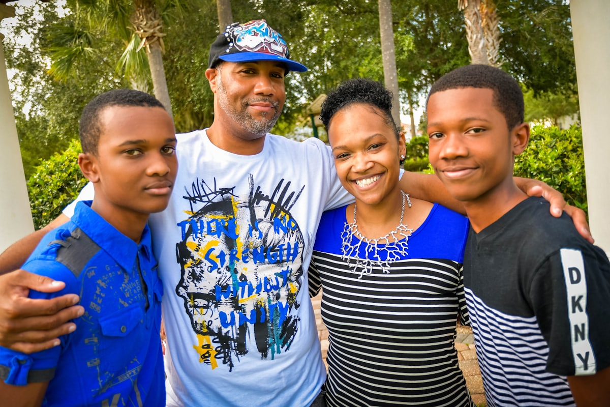 A smiling family of four